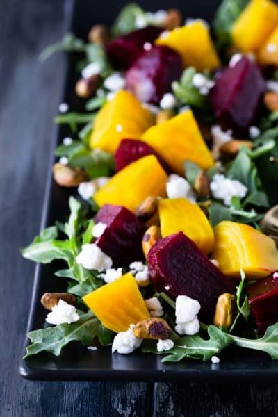 Easy Roasted Beet Salad With Goat Cheese Arugula And Pistachios Garnish With Lemon