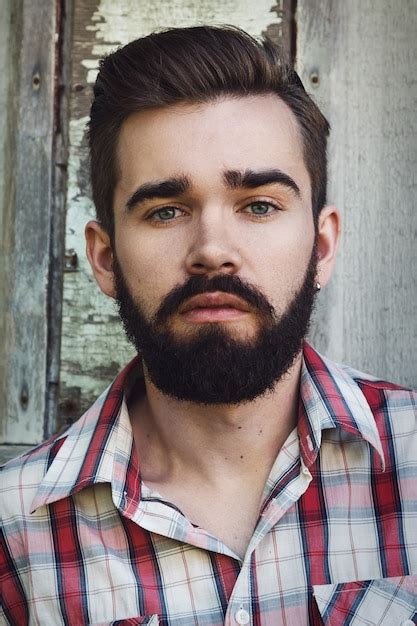 Premium Photo Bearded Man In Checkered Shirt