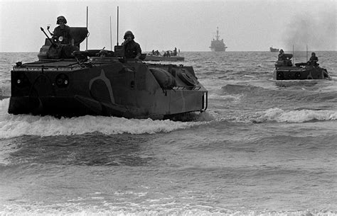 An LVTP7 Tracked Landing Vehicle Is Driven Ashore By Marine Of The 32nd