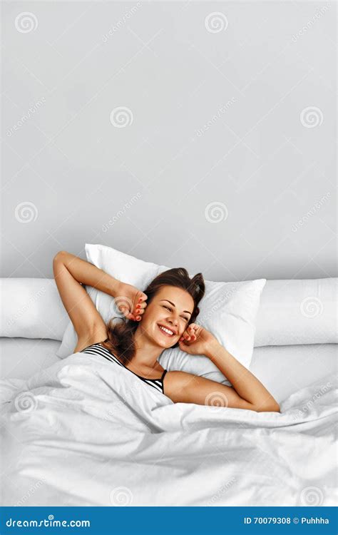 Morning Healthy Woman After Wake Up Relaxing In Bed Wellness Stock