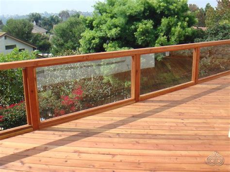 Redwood Deck With Glass Panel Railings That Easily Let In The Breathtaking View Deck Designed