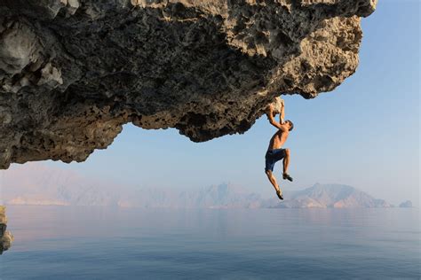 Alex Honnold Hanging On Rock Lewis Hatchett