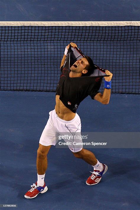 Novak Djokovic Of Serbia Rips His Shirt Off After Winning News Photo