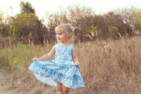 Funny Girl Dancing on the Lawn Stock Image - Image of farm, beautiful ...