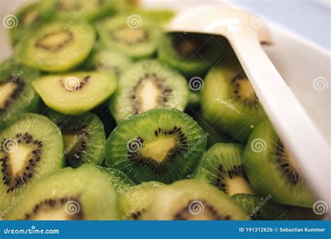 Tray Filled With Sliced Fresh Kiwi Fruit Stock Photo Image Of