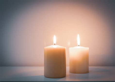 Two Lit Candles Stock Photos Pictures And Royalty Free Images Istock