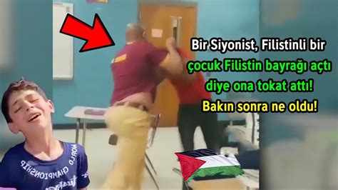 Bir Siyonist Filistinli Bir Çocuk Filistin Bayrağı Açtı Diye Ona Tokat