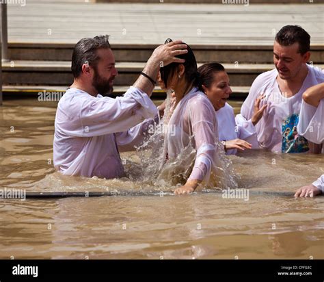 Russian Orthodox Christian Baptism On The Israeli Bank Of The River Jordan From Bethany Beyond