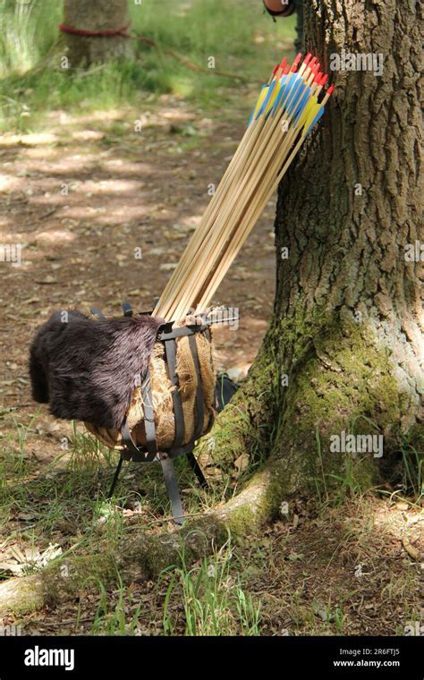 A Collection Of Archery Arrows In A Metal Basket Stock Photo Alamy