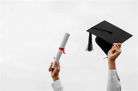 Man Hand Holding Graduation Cap Education Concept Stock Photo