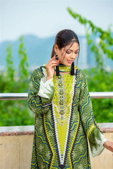 Premium Photo Cute Shy Girl Portrait Wearing Green Desi Dress And