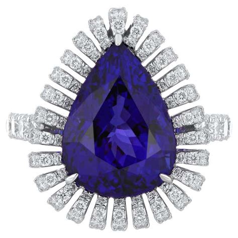 Oval Violet Tanzanite With Diamond Engagement Halo Ring 18 Karat White