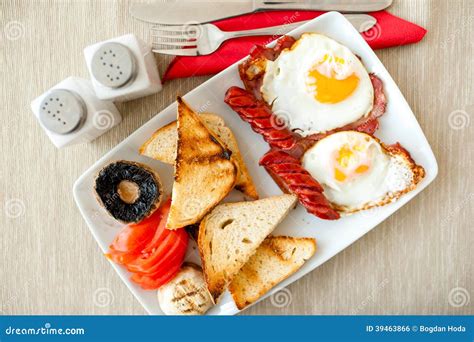 Breakfast With Eggs Bacon Sausages Toast Bread Stock Photo Image