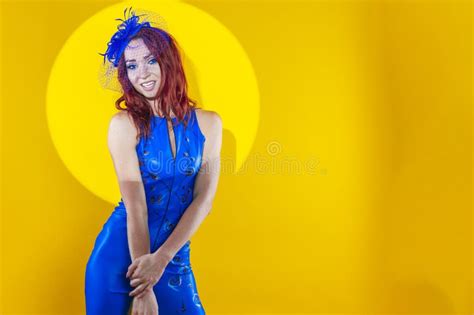 Winsome Woman In Blue Artistic Dance Suit Posing In Shawl Hat With