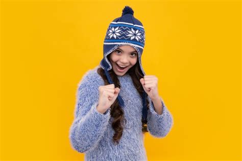 Premium Photo | Beautiful winter kids portrait teenager girl posing ...