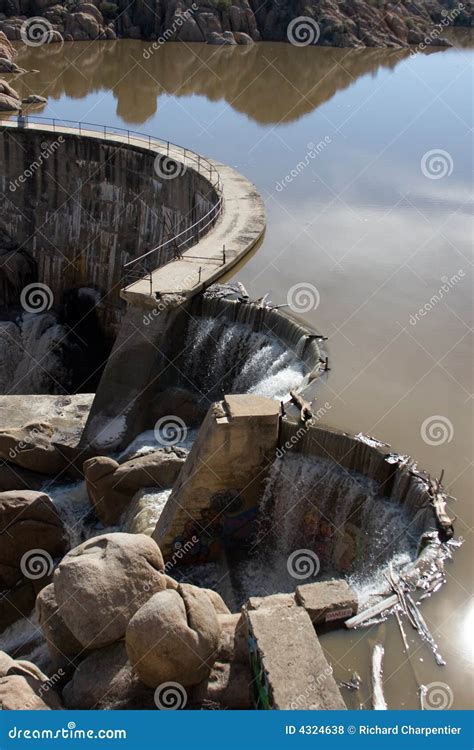 Water Flowing Over A Dam Stock Photo Image Of Reflections