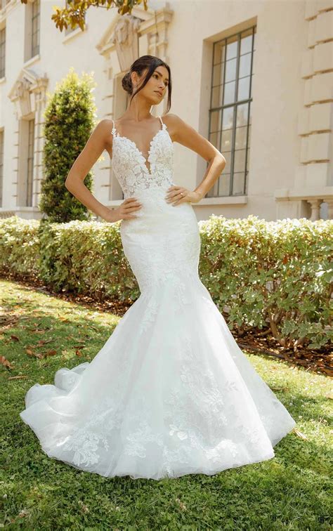 Glamorous Lace Fit And Flare Wedding Dress With Plunging Neckline