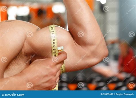 Man Measuring Size Of His Biceps Stock Photo Image Of Athlete