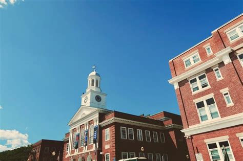 Premium Photo Old Brick Buildings And Clock Tower