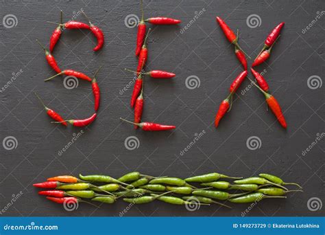 Word Sex Red Hot Chili Peppers On Black Background On Black Table Swx Letter Arranged From Red