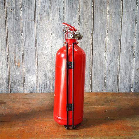 Modern Red Fire Extinguisher Tramps Prop Hire