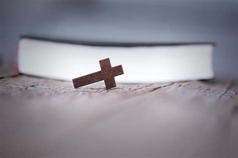 Premium Photo Cross With Holy Bible On Table