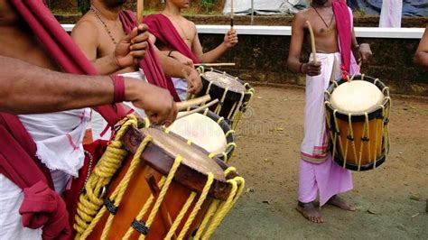 Indian Men Play Traditional Percussion Instrument Chenda In Kerala