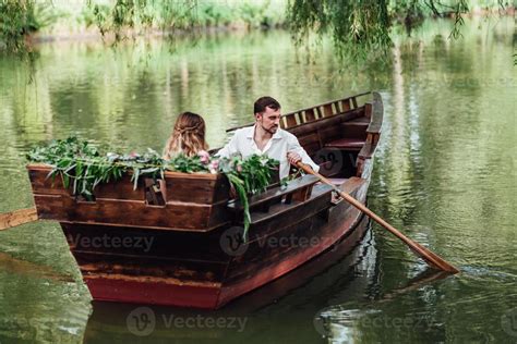 A Boat Trip For A Guy And A Girl Along The Canals And Bays Of The River