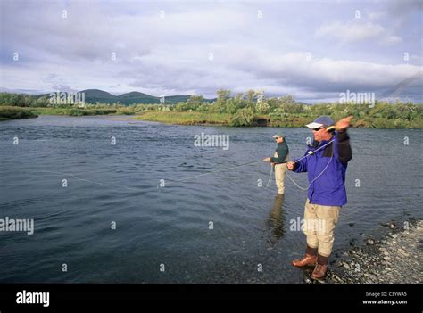 Men Fly Fishing Stock Photo Alamy