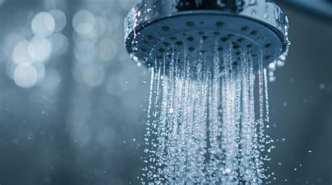 Premium Photo Closeup Of Shower Head With Clean Water Streaming Out