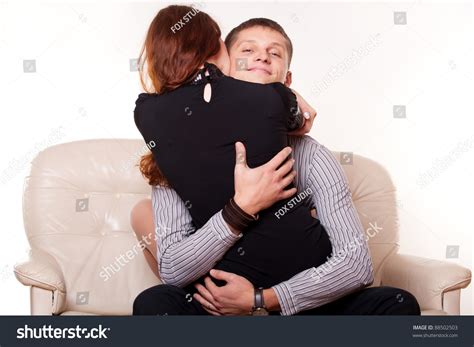 Young Man Embraces Woman Who Sitting Stock Photo 88502503 Shutterstock