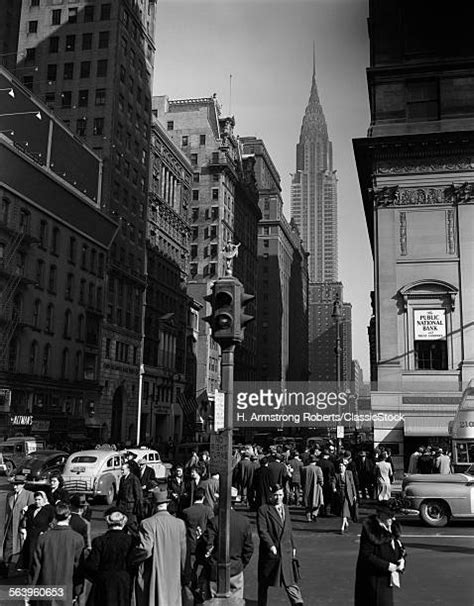 Crowds Of Pedestrians On Fifth Avenue Photos And Premium High Res