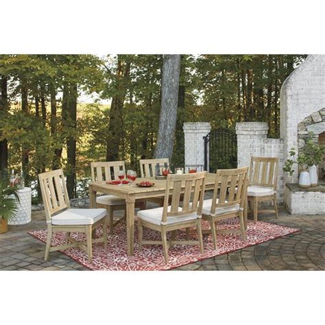 Ashley Clare View Beige Outdoor Dining Set Outdoor And Patio Premier Rental Purchase