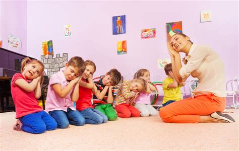 Kids In Group Play Game Pretending To Sleep Stock Image Image 64492889