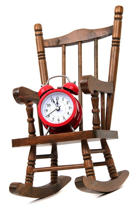 Antique Wooden Rocking Chair Paired With A Bold Red Alarm Bell On A