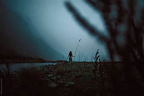 Youthful Free Spirited Girl Runs Naked Through A Summer Rain Storm By Stocksy Contributor