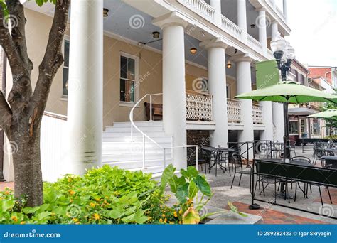 Empty Street Cafe In An Old American Town On A Summer Day Tables