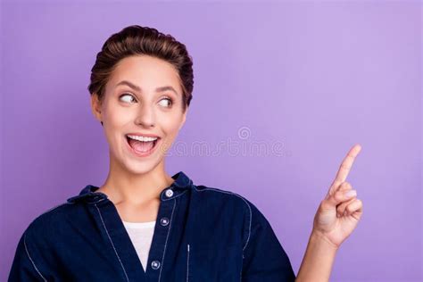 Photo Of Impressed Brunette Millennial Lady Point Look Empty Space Wear