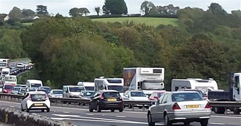 A38 At Standstill After Car Crashes And Overturns Latest Updates