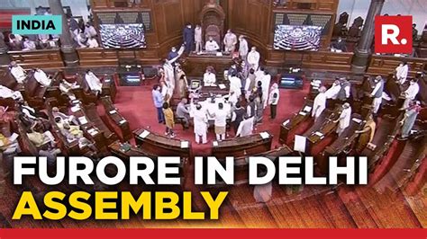 Bjp Mlas Marshalled Out Of Delhi Assembly For Protesting Against