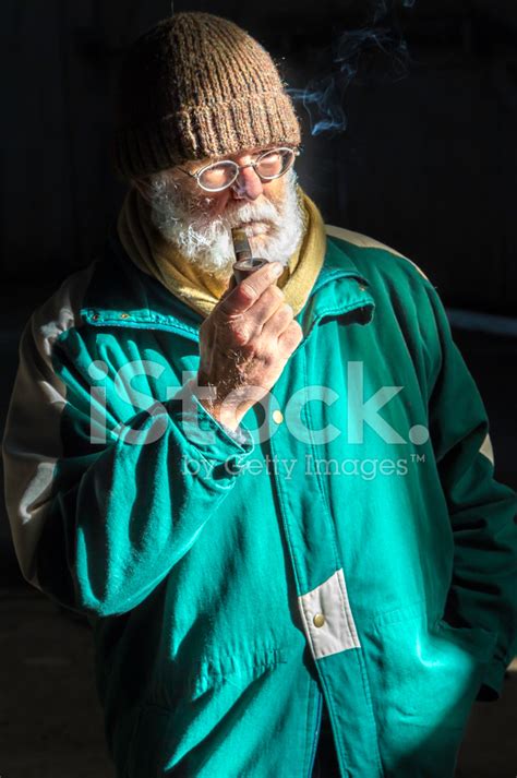 Old Man Smoking A Pipe Stock Photo Royalty Free Freeimages