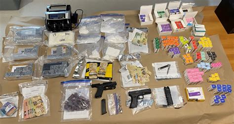 Drug Trafficking Investigation Results In Drugs Cash Weapons Seized