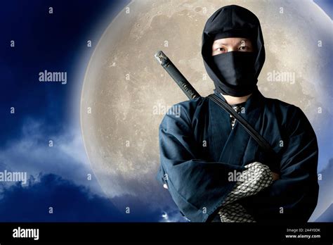 Japanese Ninja With Shining Full Moon Stock Photo Alamy