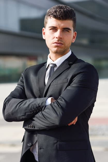 Free Photo Attractive Businessman With Crossed Arms