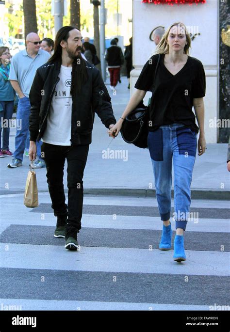 Musician Steve Aoki Hold Hands With His Fiancee Tiernan Cowling As They