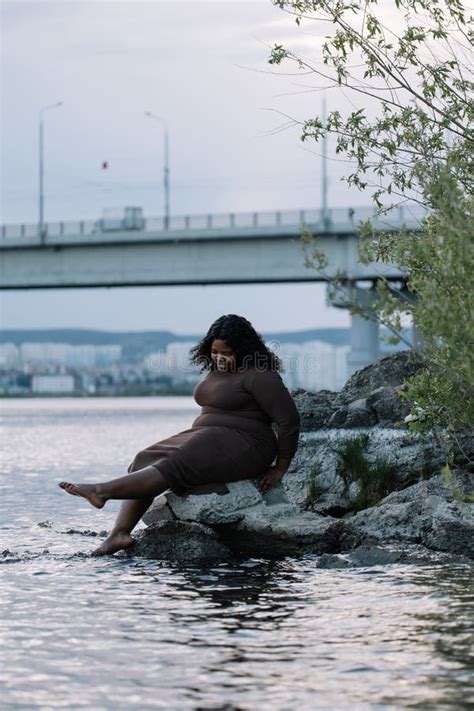 Vertical Thoughtful Barefoot Pretty Curly Plump Full Figured Afro