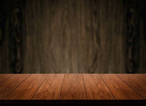 Rustic Wood Table On Wooden Wall Background