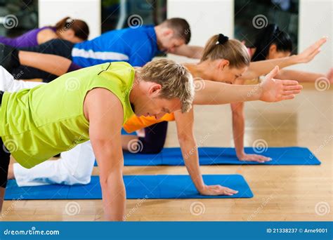 Stretching And Gymnastics In Fitness Club Or Gym Royalty Free Stock