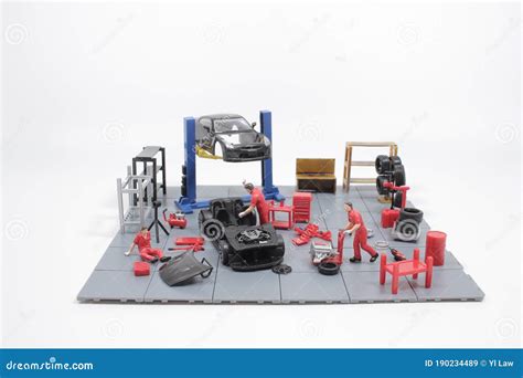 A Mini Mechanics Repairing Toy Carconcept Of The Workshop Stock Image