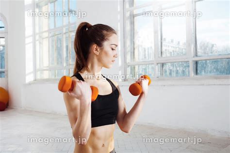 Beautiful Slim Brunette Doing Some Push Ups A The Gym